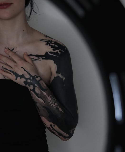 Blackwork sleeve tattoo by Zuzana Mala